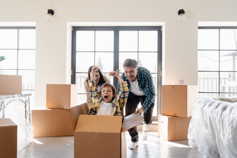 First home buyers unpacking boxes