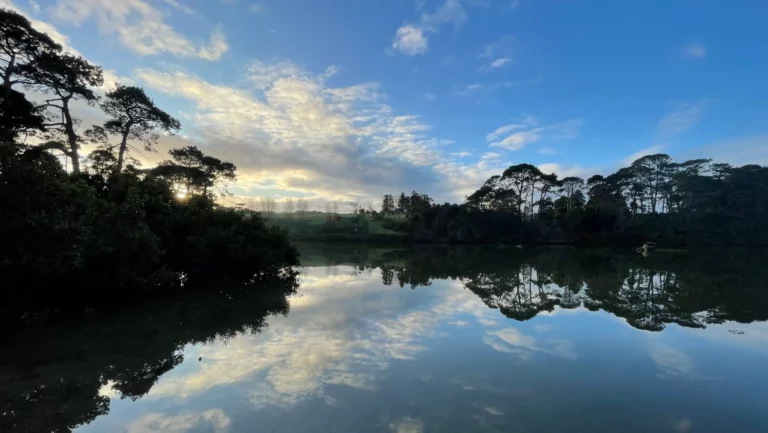 Riverhead sunrise still water landscape