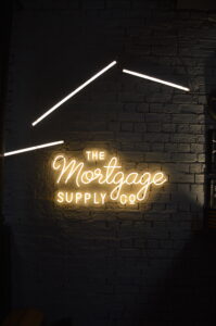 The Mortgage Supply Co Logo Glowing in the Dark